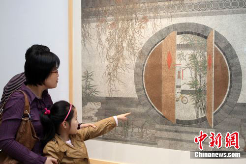 北京画家李强的一幅《家园》，备受观者喜爱。李克祥 摄