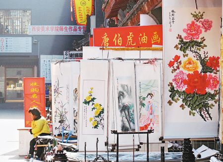 书院门文化一条街上的书画市场鱼龙混杂。