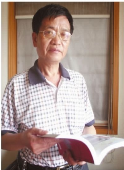 湖南省收藏协会副会长、长沙市集邮协会副秘书长卢伯雄。 (资料图片)