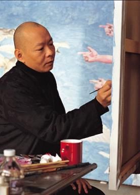 创作中的岳敏君